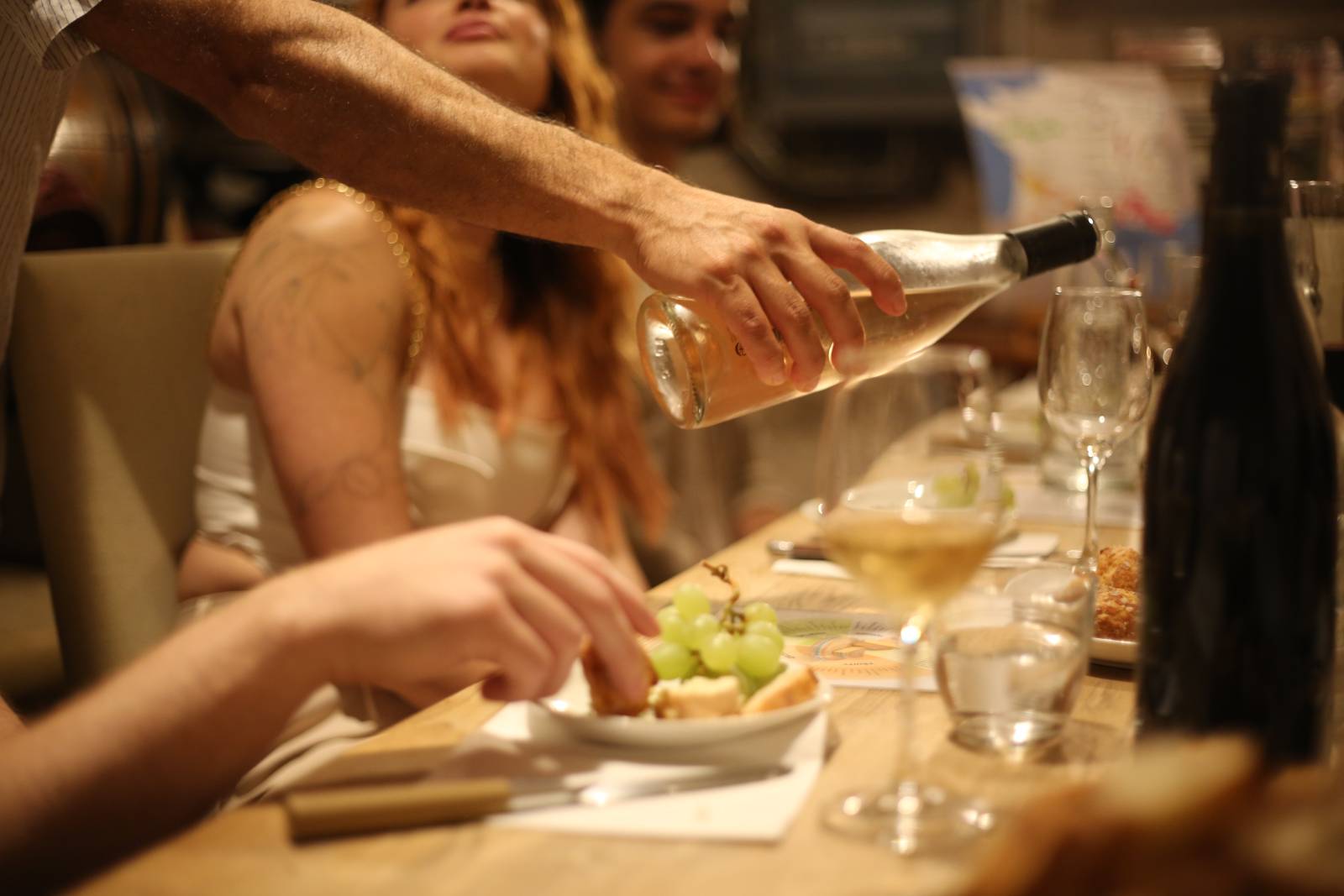 Wine being served during a cheese & wine workshop 