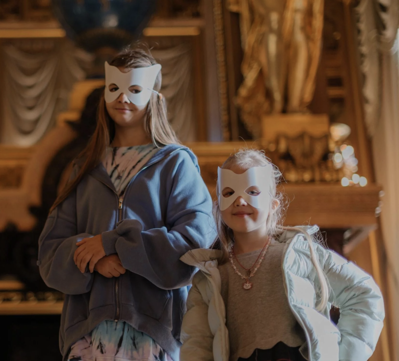Two girls smiling with face masks during the clue do family & kids Opera Garnier Private Guided Tour