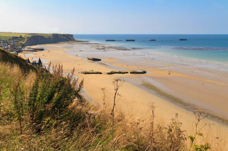Arromanches Beach, remnants of Mulberry Harbor