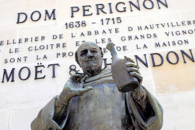 Dom Perignon Statue, one stop during the From Paris: Champagne Private Sightseeing Tour