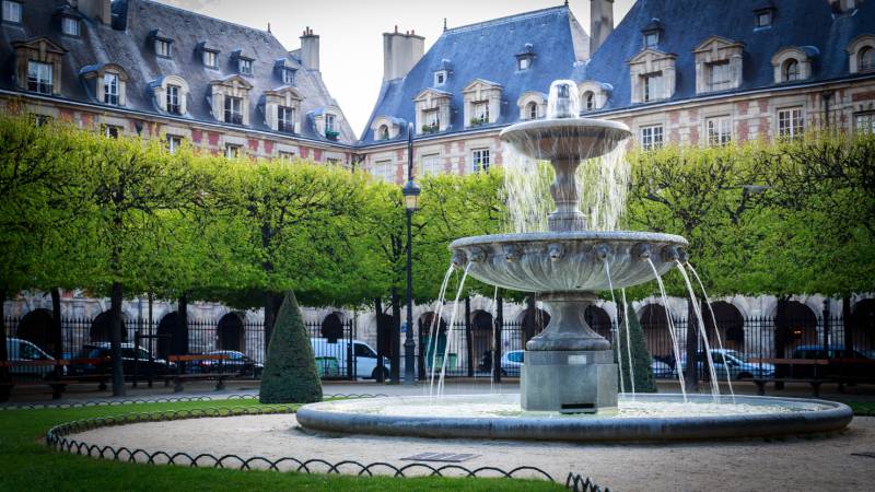 Place des Vosges water fountain in Paris