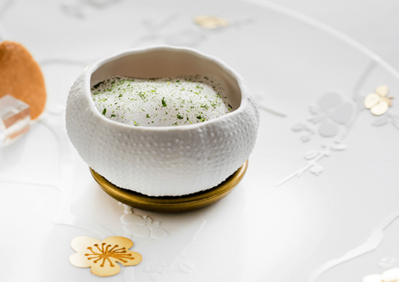 detail of a plate during a luxury michelin star dinner cruise in Paris along the Seine