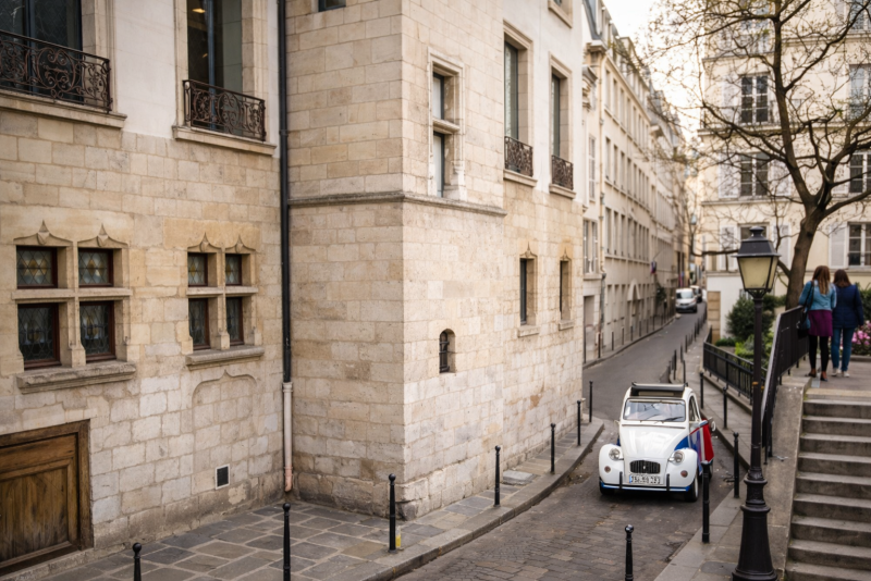2CV car in a Parisian Street